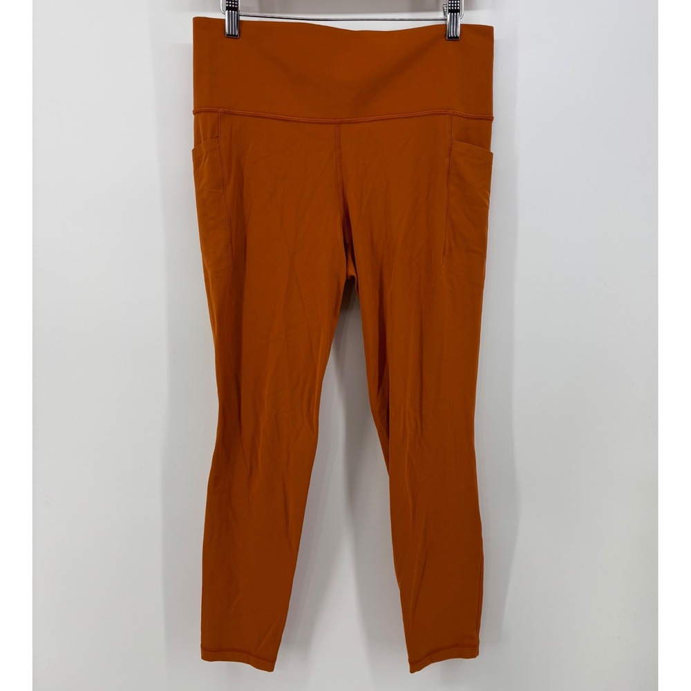Athleta Salutation Stash Tight Women's Large Orange High Rise Cropped Pockets